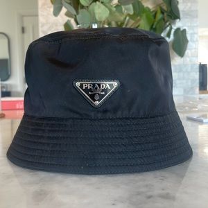 Prada bucket hat. Worn a few times. With original box.